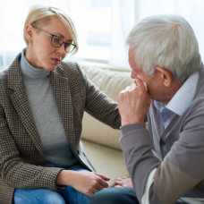 anxious man talking to his doctor