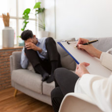 anxious man seeking help to the doctor