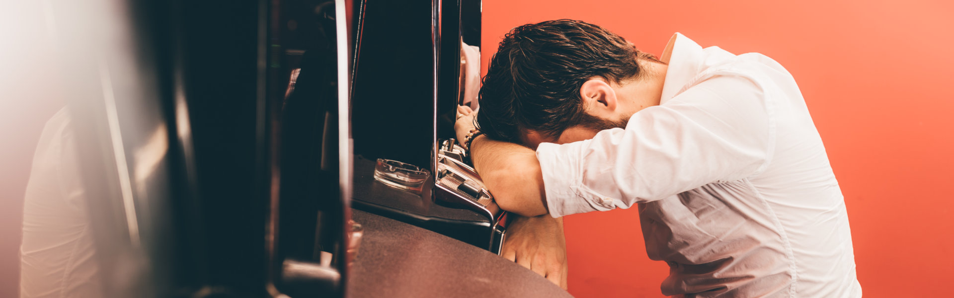 man sleeping inside a casino