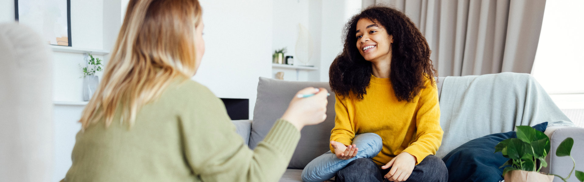 happy woman talking to her doctor